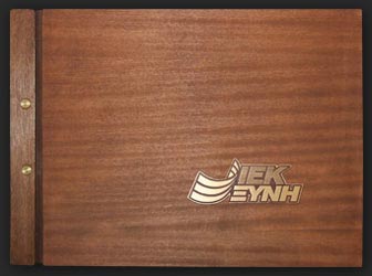 Wooden cover with brass ornaments 